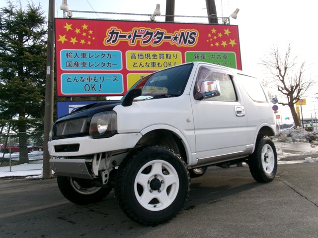 スズキ ジムニー 660 XL 4WD 5速MT/リフトアップ/社外ボンネット 宮城県